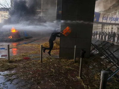BRUSSELS, BELGIUM - FEBRUARY 01: Police spray waters to protesters near the entrance of the European Parliament building during the farmer protest action as they demand to have better conditions to grow, produce and maintain a proper income, on the day of a special European Council meeting in Brussels, Belgium on February 1, 2024. Nicola Landemard / AnadoluNo Use USA No use UK No use Canada No use France No use Japan No use Italy No use Australia No use Spain No use Belgium No use Korea No use South Africa No use Hong Kong No use New Zealand No use Turkey