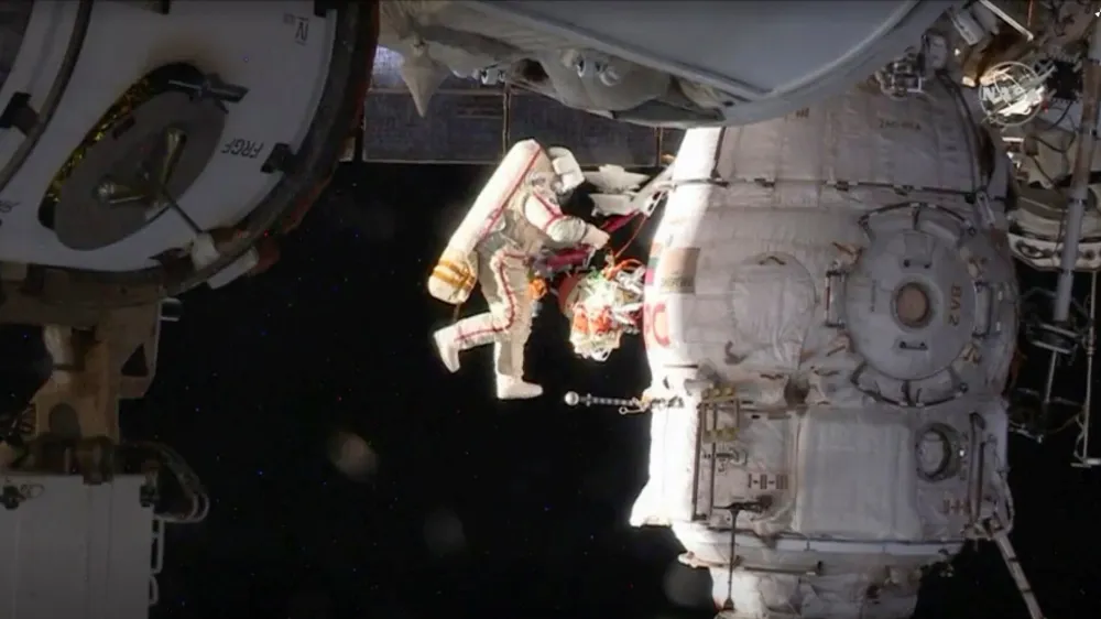 Russian cosmonaut Oleg Kononenko conducts a spacewalk outside the International Space Station Space (ISS) in this still image captured from NASA video in space, December 11, 2018. Courtesy NASA TV/Handout via REUTERS ATTENTION EDITORS - THIS IMAGE HAS BEEN SUPPLIED BY A THIRD PARTY.   TPX IMAGES OF THE DAY