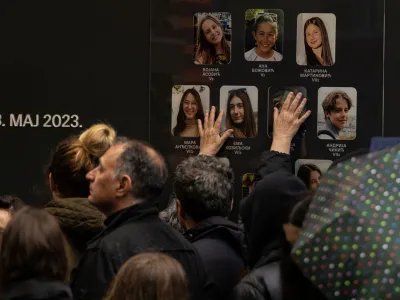 People gather to pay tribute to the victims of the mass shooting at Vladislav Ribnikar elementary school during the first anniversary commemoration in Belgrade, Serbia, May 3, 2024. REUTERS/Marko Djurica