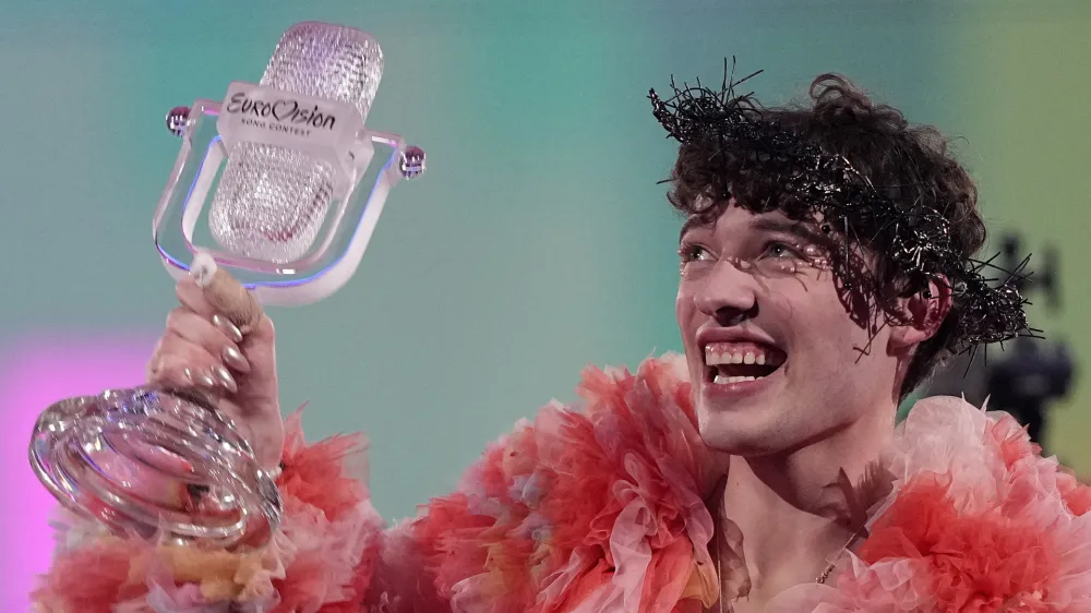 Nemo of Switzerland, who performed the song The Code, celebrates after winning the Grand Final of the Eurovision Song Contest in Malmo, Sweden, Saturday, May 11, 2024. (AP Photo/Martin Meissner)