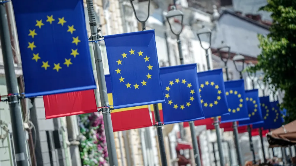 13 May 2024, Romania, Cluj-Napoca: Romanian and European flags adorn a street in Cluj-Napoca ahead of the European Parliament elections scheduled for 6-9 June 2024. Photo: Kay Nietfeld/dpa
