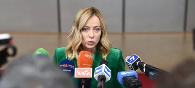 FILED - 15 December 2023, Belgium, Brussels: Italian Prime Minister Giorgia Meloni speaks to media upon her arrival to attend the second day of the EU Summit. Meloni has accused a German search-and-rescue organization of ignoring the role of human traffickers in the deaths of thousands in response to accusations she was working on a "dystopian migration policy" with Libya. Photo: Gaetan Claessens/EU COUNCIL/dpa - ATTENTION: editorial use only and only if the credit mentioned above is referenced in full