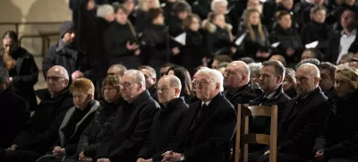 German President Frank-Walter Steinmeier, foreground, and Chancellor Olaf Scholza, next to him, attend memorial service for victims of Friday's Christmas Market attack, where a car drove into a crowd, in Magdeburg, Germany, Saturday, Dec. 21, 2024. (AP Photo/Ebrahim Noroozi)