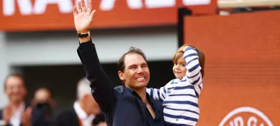 Tennis - French Open - Roland Garros, Paris, France - May 25, 2025 Former tennis player and record French Open winner Spain's Rafael Nadal and his son Rafael Nadal Junior during a tribute ceremony REUTERS/Lisi Niesner