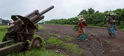 FILE PHOTO: Esperance Zawadi and her colleague carry fresh cabbages to the market months after their return from the Kanyaruchinya camp where they took refuge following clashes between the M23 rebels and the Congolese army in Kibumba, Nyiragongo territory of North Kivu province in eastern Democratic Republic of Congo April 14, 2025. REUTERS/Arlette Bashizi/File Photo