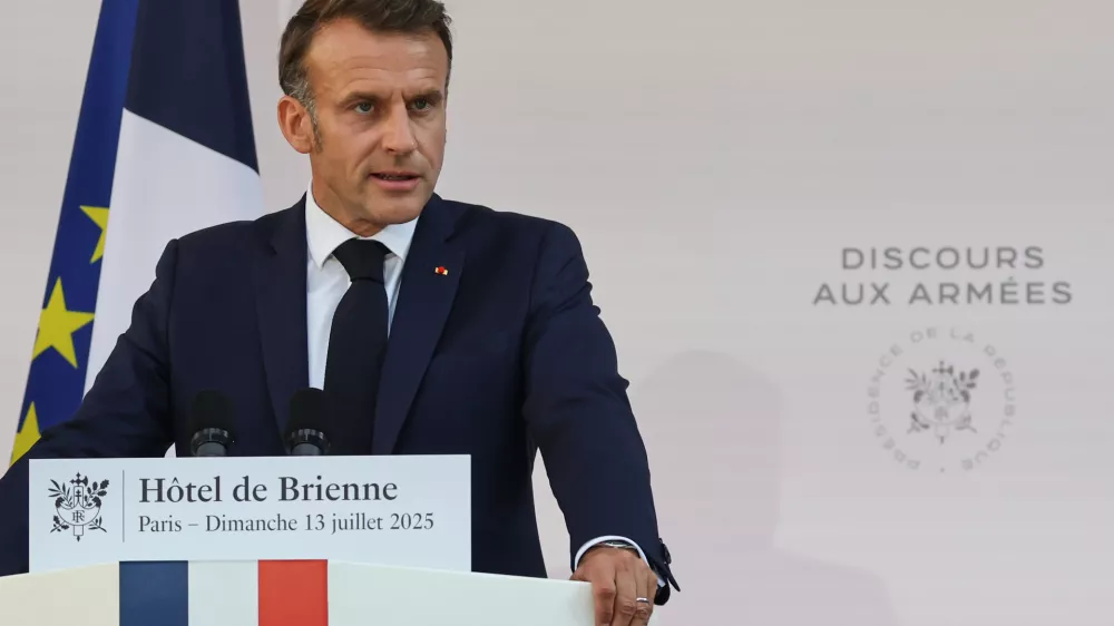 French President Emmanuel Macron speaks to the army leaders at the Hotel le Brienne, Sunday, July 13, 2025, ahead of the Bastille Day parade in Paris. (Ludovic Marin, Pool Photo via AP)