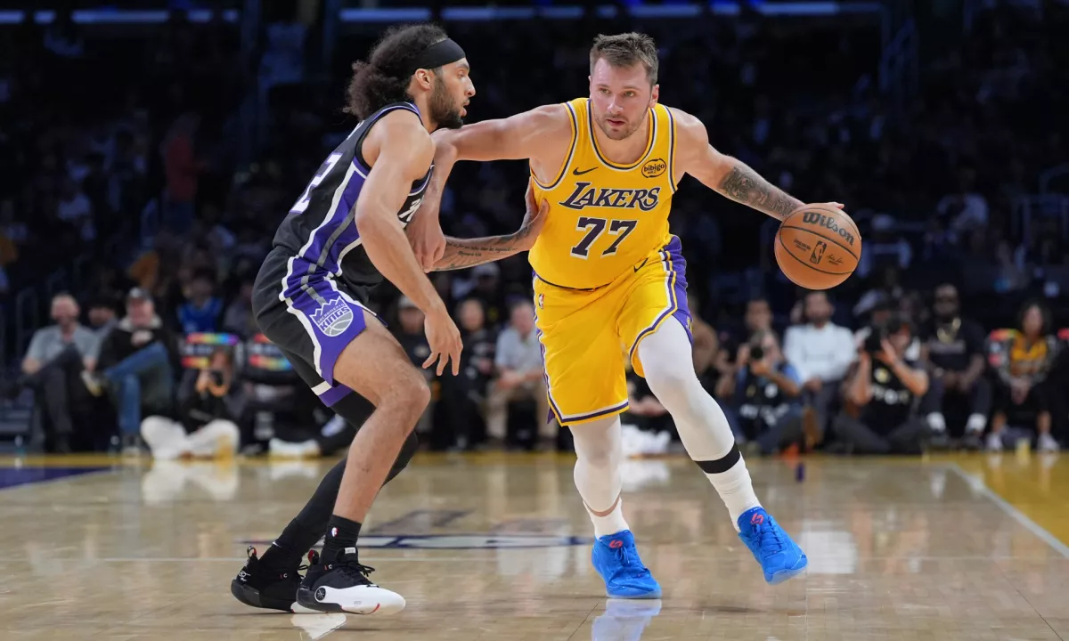 Dončić v dobre pol ure do 31 točk