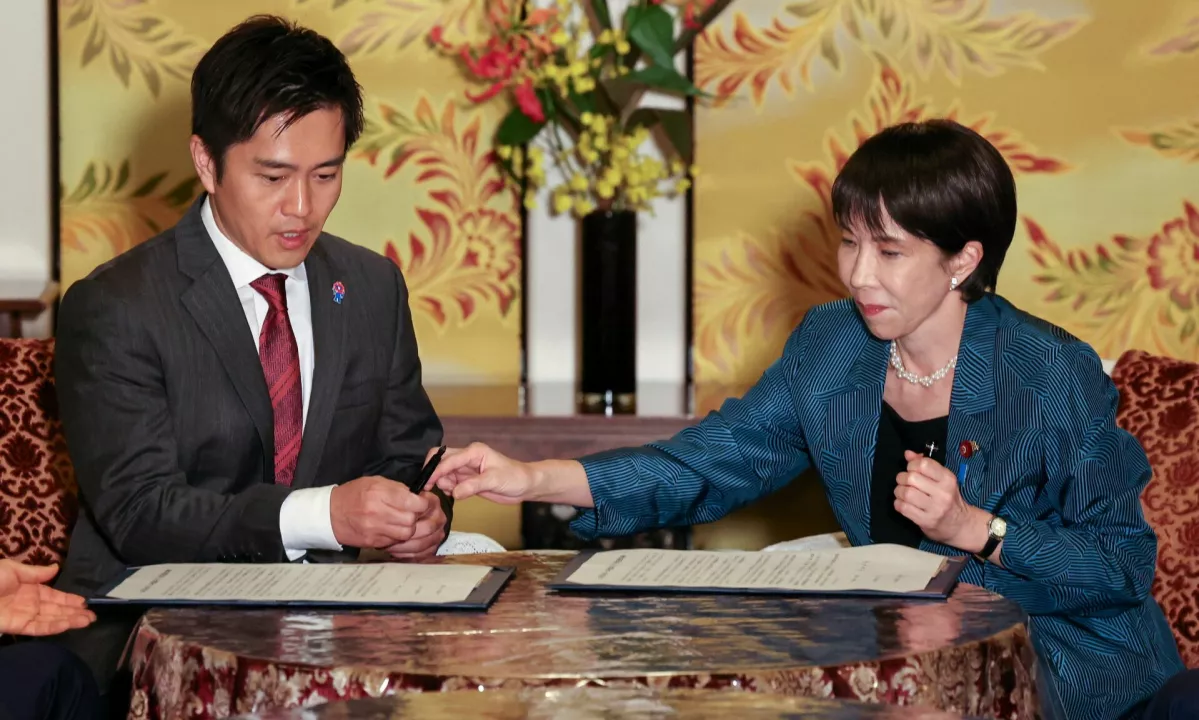 Koalicijski dogovor odprl pot za imenovanje prve premierke