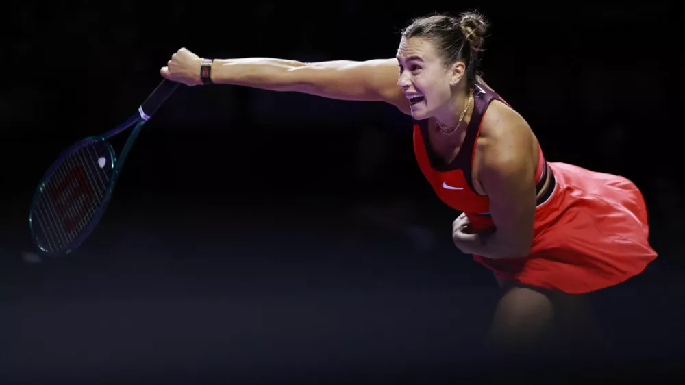 Tennis - WTA Finals - Riyadh - King Saud University Indoor Arena, Riyadh, Saudi Arabia - November 2, 2025 Belarus' Aryna Sabalenka in action during her round of 16 match against Italy's Jasmine Paolini REUTERS/Stephanie Lecocq