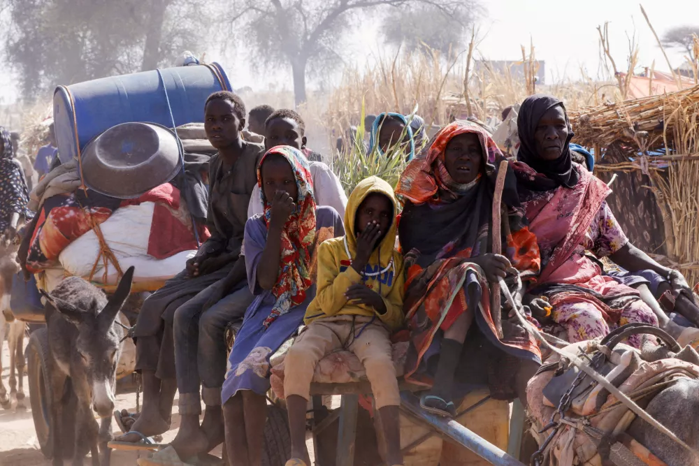 FILE PHOTO: Displaced people ride a an animal-drawn cart, following Rapid Support Forces (RSF) attacks on Zamzam displacement camp, in the town of Tawila, North Darfur, Sudan April 15, 2025. REUTERS/Stringer/File Photo
