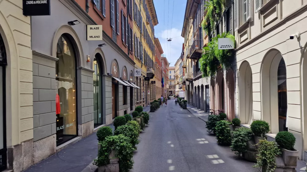 Milan, Italy - June 15, 2025: Via Santo Spirito, a high-end shopping street among historic palaces and neo-Renaissance courtyards in the Montenapoleone fashion district, Quadrilatero della Moda.