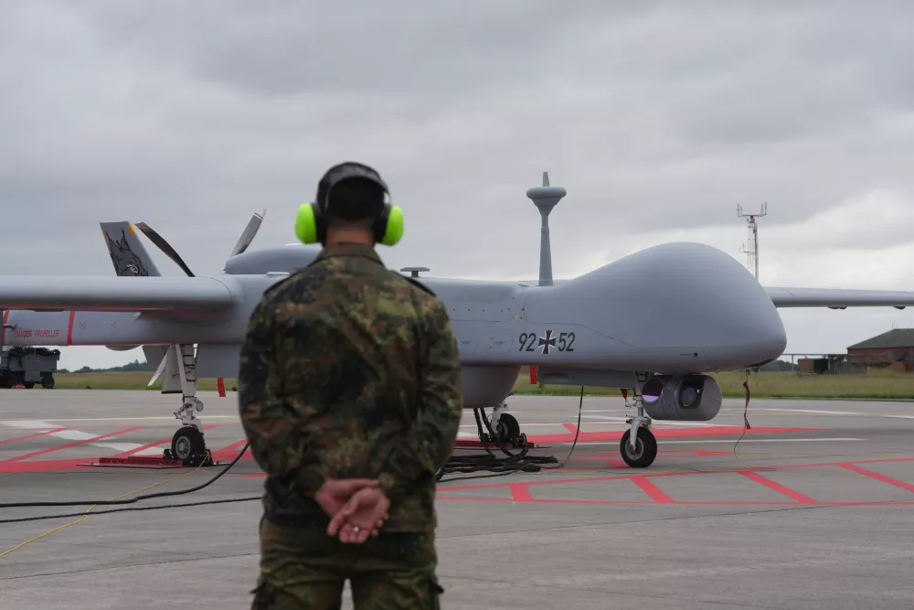 03 June 2024, Schleswig-Holstein, Jagel: A Bundeswehr Heron drone parks on the airfield of Tactical Air Force Wing 51 "Immelmann" during the NATO "Tiger Meet" air force training exercises "Tiger Meet". The international exercise in Jagel, features around 60 fighter jets and helicopters from 11 NATO countries, along with participants from Switzerland and Austria. Photo: Marcus Brandt/dpa