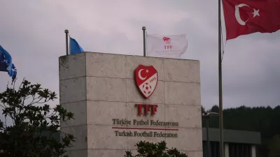 A Turkish flag waves at the Turkish Football Federation headquarters, in Istanbul, Turkey, Wednesday, Nov. 12, 2025. (AP Photo/Francisco Seco)