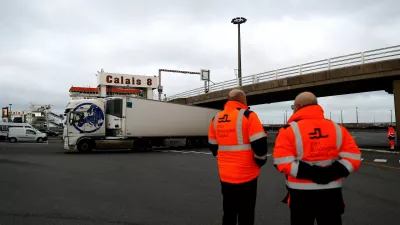 ﻿01 January 2021, France, Calais: Trucks arrive at the harbour of Calais after crossing from Britain on the day that the Brexit transition period ends and Britain leaves the EU single market and customs union four-and-a-half years after voting to leave the bloc. Hundreds of heavy goods vehicles early Friday passed through the Channel Tunnel connecting Britain and France "without any problem", its operator said, dispelling fears of immediate snarl-ups as Brexit took effect. Photo: Sameer Al-Doumy/AFP/dpa