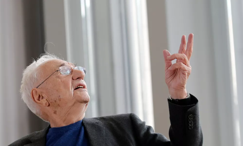 FILE - American architect Frank Gehry speaks to journalists during the press day of his latest creation, the Louis Vuitton Foundation art museum and cultural center, in Paris, Oct. 17, 2014. (AP Photo/Christophe Ena, File)