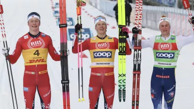 05 December 2025, Norway, Trondheim: Norway's winner Johannes Hoesflot Klaebo (C), second-placed Oskar Opstad Vike (L)&nbsp;and Sweden's third-placed Alvar Myhlback, celebrate after the Men's Sprint Final Classic competition during the FIS Cross-Country World Cup in Trondheim. Photo: Geir Olsen/NTB/dpa
