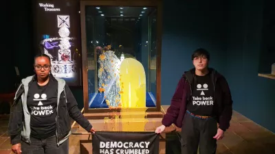 06 December 2025, United Kingdom, London: Undated handout photo issued by Take Back Power shows two supporters of the group after dessert was thrown over the Crown Jewels in the Tower of London. Four protesters were arrested for throwing food at the display case. Photo: Take Back Power/PA Media/dpa