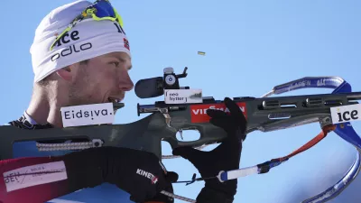 Vetle Sjaastad Christiansen of Norway competes during the men's 4 x 7.5km relay race at the biathlon World Cup in Anterselva, Italy, Sunday, Jan. 23, 2022. (AP Photo/Matthias Schrader)