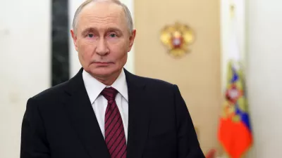 Russian President Vladimir Putin delivers a video address to congratulate officers and veterans on Security Agency Worker's Day at the Kremlin, in Moscow, on Saturday, Dec. 20, 2025. (Mikhail Metzel, Sputnik, Kremlin Pool Photo via AP)