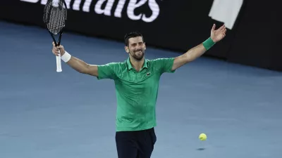 Tennis - Australian Open - Melbourne Park, Melbourne, Australia - January 31, 2026 Serbia's Novak Djokovic celebrates winning his semi final match against Italy's Jannik Sinner REUTERS/Tingshu Wang