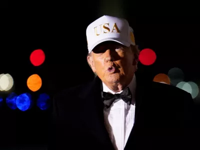 U.S. President Donald Trump speaks after disembarking from Air Force One on his arrival at Palm Beach International Airport in West Palm Beach, Florida, U.S., January 31, 2026. REUTERS/Nathan Howard