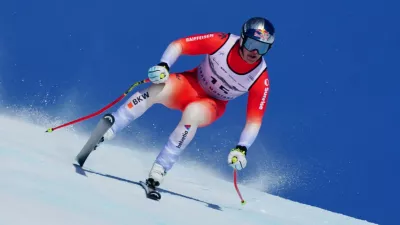 Switzerland's Franjo von Allmen speeds down the course during an alpine ski, men's World Cup downhill, in Crans Montana, Switzerland, Sunday, Feb. 1, 2026. (AP Photo/Pier Marco Tacca)