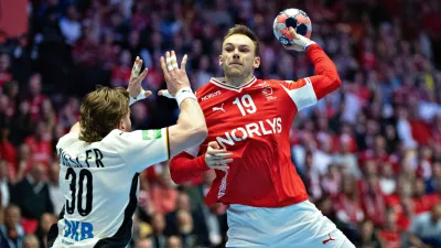 Denmark's Mathias Gidsel, right, throws the ball during the Euro 2026 final match between Denmark and Germany in Herning, Denmark, Sunday, Feb. 1, 2026. (Thomas Traasdahl/Ritzau Scanpix via AP)
