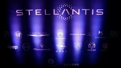 FILE PHOTO: The logo of Stellantis is seen next to the logos of other car brands during the Automotive Industry Day summit in Paris, France, November 4, 2025. REUTERS/Sarah Meyssonnier/File Photo