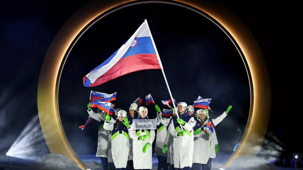 Milano Cortina 2026 Olympics - Opening Ceremony - Predazzo, Italy - February 06, 2026. Flag bearers Domen Prevc of Slovenia and Nika Prevc of Slovenia with contingent in the athletes parade during the opening ceremony REUTERS/Kai Pfaffenbach