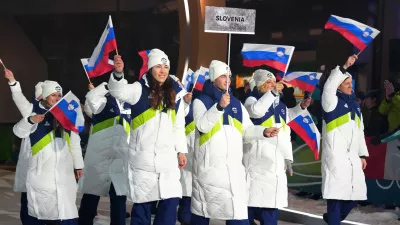 Team Slovenia arrives for the Olympic opening ceremony at the 2026 Winter Olympics, in Cortina d'Ampezzo, Italy, Friday, Feb. 6, 2026. (AP Photo/Misper Apawu)