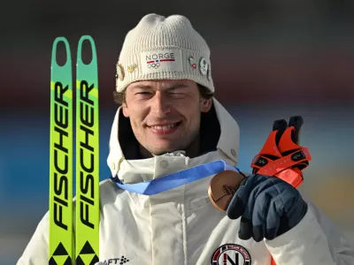 10 February 2026, Italy, Antholz: Norway's Sturla Holm Laegreid celebrates his bronze medal at the medal ceremony after the Men's Biathlon 20km individual event during the Milano Cortina 2026 Winter Olympic Games at the Anterselva Biathlon Arena in Antholz. Photo: Hendrik Schmidt/dpa