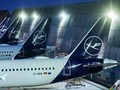 Lufthansa aircraft are parked at the airport in Frankfurt, Germany, on Wednesday, Feb. 11, 2026, the evening before Lufthansa pilots go on a warning strike. (AP Photo/Michael Probst)