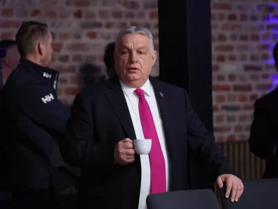 Hungary's Prime Minister Viktor Orban waits for the start of a round table meeting for the EU summit at Alden Biesen Castle in Bilzen-Hoeselt, Belgium, Thursday, Feb. 12, 2026. (AP Photo/Omar Havana)