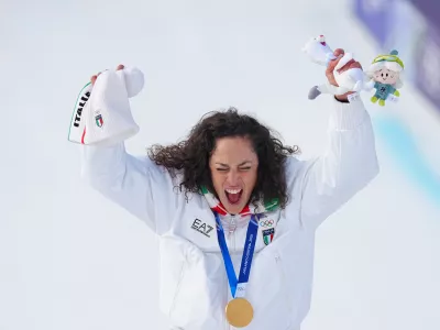 12 February 2026, Italy, Cortina D'ampezzo: Italy's gold medalist Federica Brignone celebrates on the podium of the Women's Super-G event at the Tofane Alpine Skiing Centre in Cortina d'Ampezzo during the Milano Cortina 2026 Winter Olympic Games. Photo: Michael Kappeler/dpa