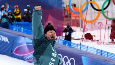 Milano Cortina 2026 Olympics - Alpine Skiing - Men's Giant Slalom Victory Ceremony - Stelvio Ski Centre, Bormio, Italy - February 14, 2026. Gold medallist Lucas Pinheiro Braathen of Brazil celebrates on the podium during the men's giant slalom victory ceremony REUTERS/Denis Balibouse