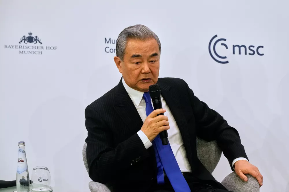 China's Foreign Minister Wang Yi speaks during the Munich Security Conference in Munich, Germany, Saturday, Feb. 14, 2026. (AP Photo/Michael Probst)