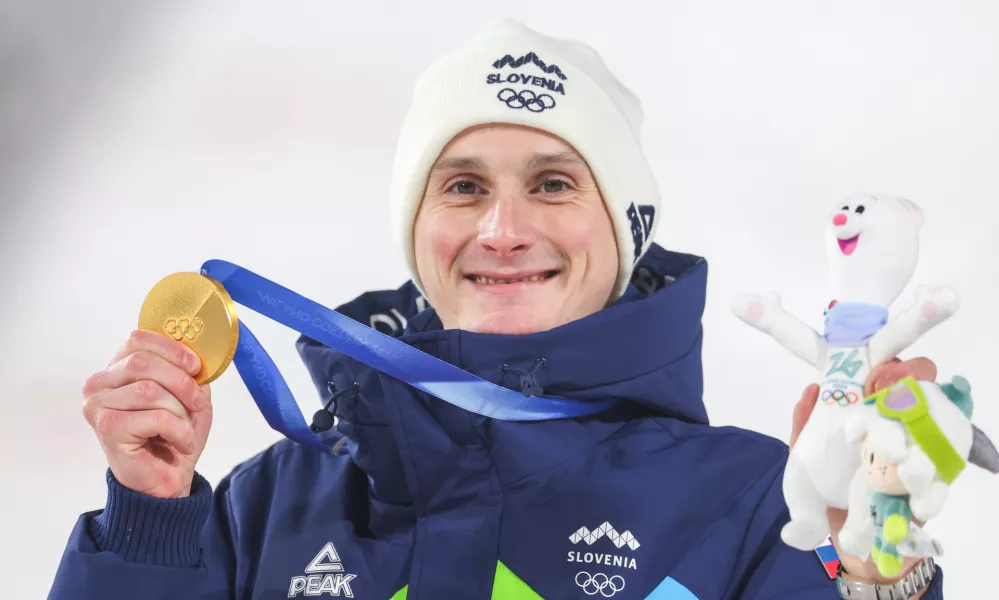 Italija, Predazzo.Zimske olimpijske igre 2026.Smucarski skoki, velika skakalnica, moski.Olimpijski prvak na veliki skakalnici Domen Prevc.