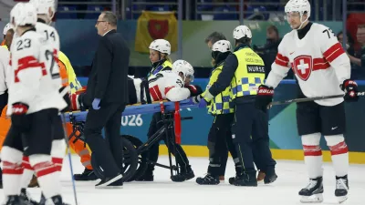Milano Cortina 2026 Olympics - Ice Hockey - Men's Preliminary Round - Group A - Canada vs Switzerland - Milano Santagiulia Ice Hockey Arena, Milan, Italy - February 13, 2026. Kevin Fiala of Switzerland is stretchered off by medical staff after sustaining an injury IMAGN IMAGES via REUTERS/Geoff Burke