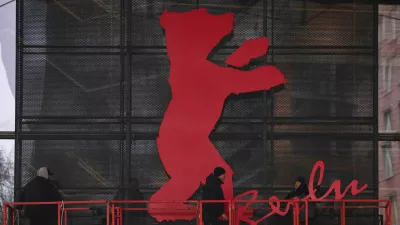 FILE PHOTO: Workers mount the bear logo at the venue entrance of the "Berlinale Palast" for the upcoming Berlinale International Film Festival in Berlin, Germany, February 6, 2026. REUTERS/Liesa Johannssen/File Photo