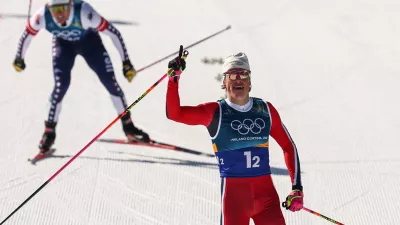 Milano Cortina 2026 Olympics - Cross-Country Skiing - Men's Team Sprint Free Final - Tesero Cross-Country Skiing Stadium, Lago, Italy - February 18, 2026. Johannes Hoesflot Klaebo of Norway celebrates as he crosses the finish line to win gold during the Men's Team Sprint Free Final REUTERS/Kacper Pempel