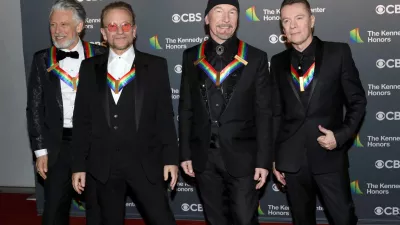 FILE - Adam Clayton, from left, Bono, The Edge and Larry Mullen Jr., of the Irish band U2, arrive at the Kennedy Center Honors in Washington on Dec. 4, 2022. (Photo by Greg Allen/Invision/AP, File)