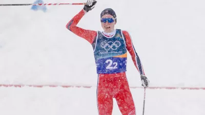 Jens Luraas Oftebro, of Norway, reacts after crossing the finish line to win the gold medal in the nordic combined team sprint at the 2026 Winter Olympics, in Tesero, Italy, Thursday, Feb. 19, 2026. (AP Photo/Evgeniy Maloletka)