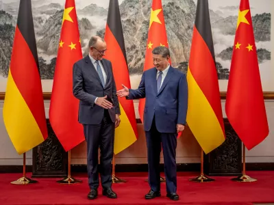 German Chancellor Friedrich Merz shakes hands with Chinese President Xi Jinping at the state guesthouse, in Beijing, China, February 25, 2026. Michael Kappeler/Pool via REUTERS   TPX IMAGES OF THE DAY