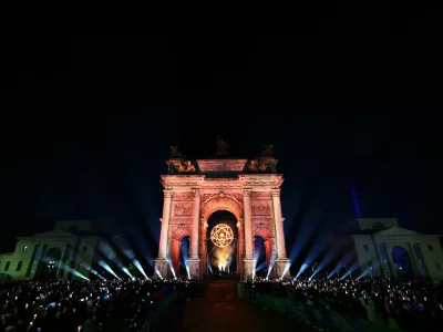 Milano Cortina 2026 Olympics - Opening Ceremony - Arco della Pace, Milan, Italy - February 06, 2026. The Olympic cauldron under the Arco della Pace in Milan is lit by Alberto Tomba and Deborah Compagnoni REUTERS/Guglielmo Mangiapane