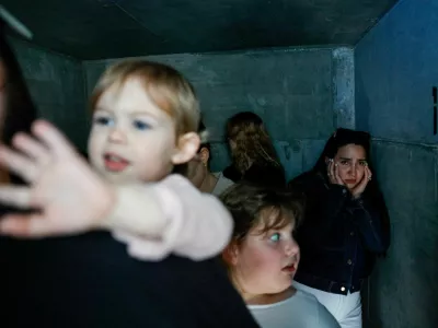 People take shelter, after missiles were launched from Iran towards Israel, following Israel and U.S. strikes on Iran, in Ashkelon, Israel, February 28, 2026. REUTERS/Amir Cohen   TPX IMAGES OF THE DAY