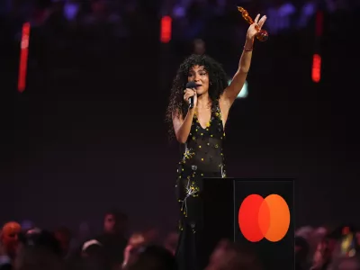 Olivia Dean wins the Pop Act award during the Brit Awards 2026 in Manchester, England, Saturday, Feb. 28, 2026. (Photo by Scott A Garfitt/Invision/AP)
