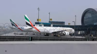 Planes are parked at Terminal 3 of the Dubai International Airport, following the United States and Israel strikes on Iran, in Dubai, United Arab Emirates, March 2, 2026. REUTERS/Raghed Waked