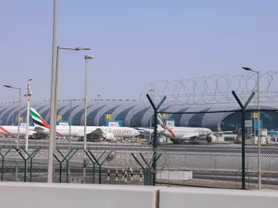 Planes are parked at Terminal 3 of the Dubai International Airport, following the United States and Israel strikes on Iran, in Dubai, United Arab Emirates, March 2, 2026. REUTERS/Raghed Waked