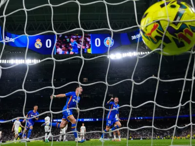 Getafe's Satriano celebrates the opening goal during a Spanish La Liga soccer match between Real Madrid and Getafe in Madrid, Spain, Monday, March 2, 2026. (AP Photo/Manu Fernandez)