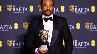 3DTM9RD London, UK. 22 February 2026. Ryan Coogler poses with the Original Screenplay Award for 'Sinners' during the 79th British Academy Film Awards, at the Royal Festival Hall, Southbank Centre, London. Photo credit should read: Matt Crossick/Alamy Live News